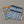 Load image into Gallery viewer, Pochette imperméable bleu ou orange Les Fantaisies de Malou
